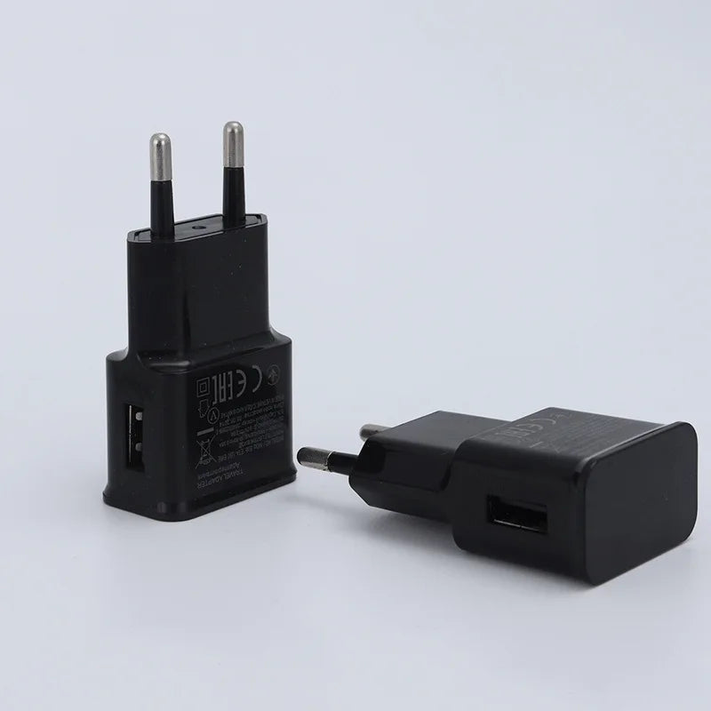 Dual USB travel charger for smartphones.